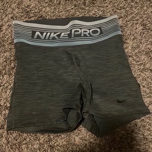 Gray/blue Nike pros